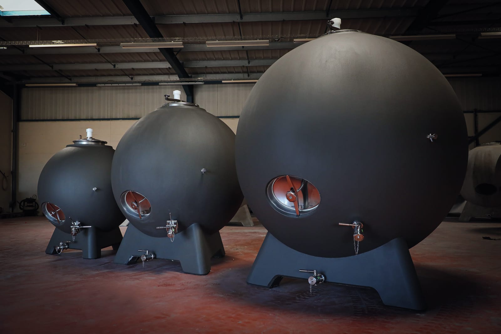 Three spherical Galileo concrete tanks in a cellar